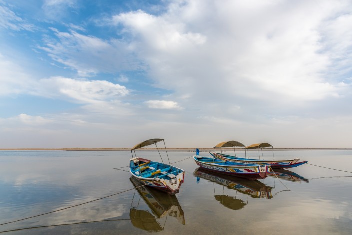 Boats reflecting in the water in Simal